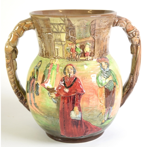 73 - ROYAL DOULTON EMBOSSED POTTERY TWO HANDLE LOVING CUP The Three Musketeers by Dumas, a limited editio... 