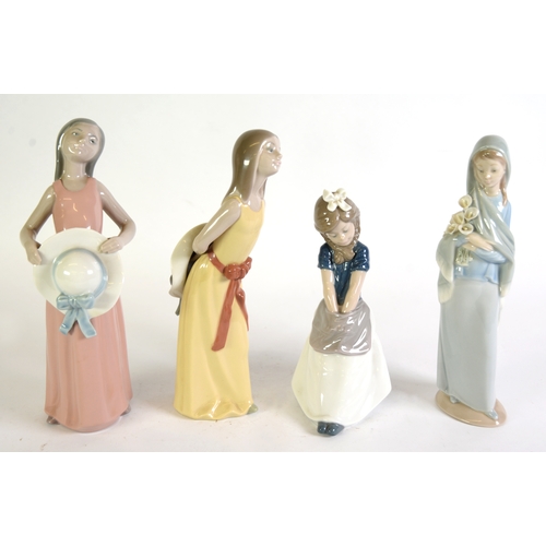 101 - FOUR LLADRO PORCELAIN YOUNG FEMALE FIGURES, viz a girl seated with her hands in her apron, two each ... 