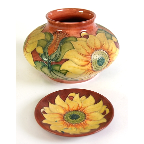 50 - MOORCROFT POTTERY SQUAT CIRCULAR BOWL, with tube lined decoration of three large yellow sunflowers w... 