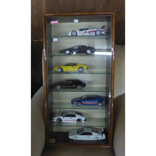 161 - SCALE MODELS; PAIR OF WALL MOUNTED COLLECTORS CABINETS CONTAINING AUTO ART SCALE MODELS AND BURAGO (... 