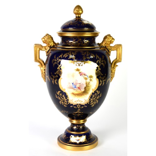 121 - COALPORT CHINA LARGE TWO HANDLED OVULAR VASE AND COVER, the domed cover having gilt pineapple finial... 