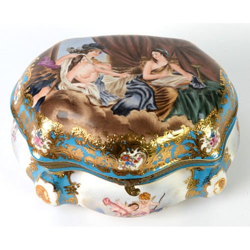 129 - TWENTIETH CENTURY CONTINENTAL PORCELAIN CARTOUCHE-SHAPE BOX METAL MOUNTED WITH HINGED COVER, the cov... 