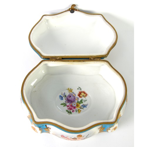 129 - TWENTIETH CENTURY CONTINENTAL PORCELAIN CARTOUCHE-SHAPE BOX METAL MOUNTED WITH HINGED COVER, the cov... 