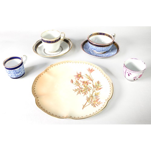 82A - THREE LATE 18th CENTURY DERBY PORCELAIN TEACUPS AND TWO SAUCERS, with royal blue and gilt floral mea... 