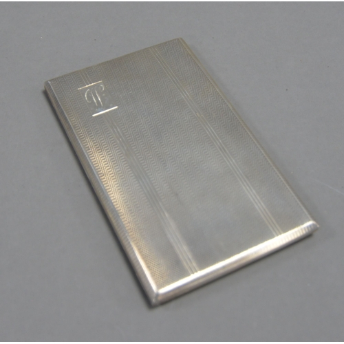 398 - GEORGE VI ENGINE TURNED SILVER POCKET CIGARETTE CASE, of oblong form with gilt interior and initiall... 