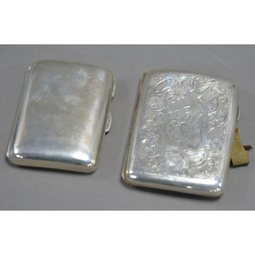 410 - TWO SILVER CURVED OBLONG POCKET CIGARETTE CASE, one engraved with flower heads and leaves, 3 ½” x 2 ... 