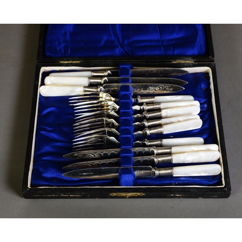 533 - CASED SET OF SIX PAIRS OF ELECTROPLATED FRUIT KNIVES AND FORKS, with mother of pearl handles