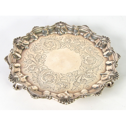 465 - VICTORIAN SILVER SMALL SALVER, of typical form with engraved floral centre, shell capped moulded bor... 