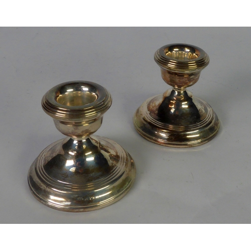 469 - PAIR OF WEIGHTED SILVER CANDLE HOLDERS, 2 ½” (6.4cm) high, Birmingham 1970, (2)