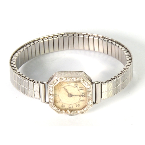 78 - LADY'S PLATINUM AND DIAMOND WRISTWATCH, with mechanical movement, with small silvered arabic dial, t... 