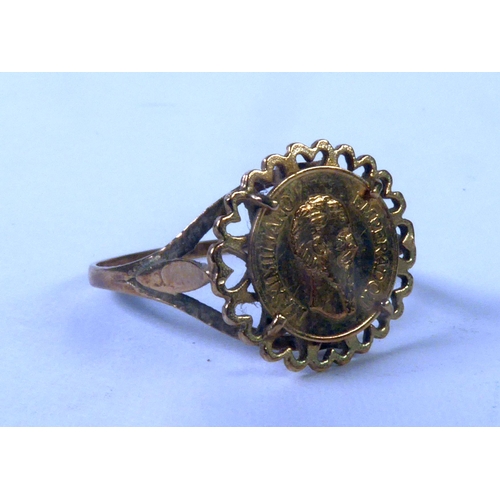 335 - 9ct GOLD RING, the top framing a small GOLD COIN - Maximiliano Emperadon, 1.4gms (c/r ring cut)