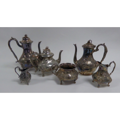 573 - FOUR PIECE ELECTROPLATED TEA AND COFFEE SET, of baluster form with bud finials and scroll handles an... 