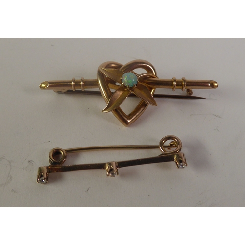 339 - EDWARDIAN 15ct GOLD BROOCH the heart-shape centre set with an OPAL. Together with a gold colour meta... 