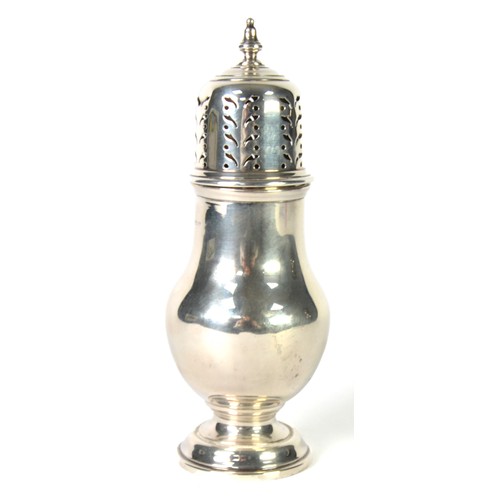 368 - SILVER PEAR SHAPED SUGAR CASTOR, the pierced high domed cover having an urn finial, on short stem an... 