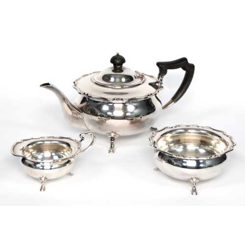 569 - ELECTROPLATED TEA SERVICE OF THREE PIECES, circular and bulbous with shaped edge to the shoulder, ra... 