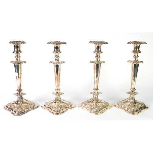 541 - SET OF FOUR 19th CENTURY SILVER ON COPPER TABLE CANDLESTICKS, with campana shaped sconces with remov... 