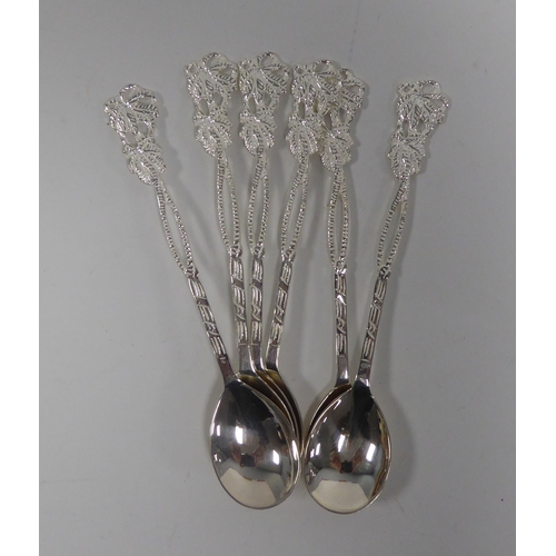 354 - SET OF SIX GREEK SILVER COLOURED METAL (830 mark) TEASPOONS, with embossed and pierced cast handles ... 