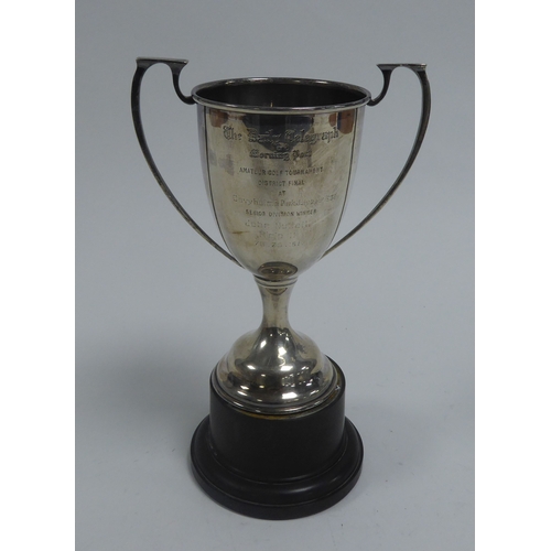 373 - GEORGE VI PRESENTATION SILVER TWO HANDLED TROPHY CUP, of typical form with angular scroll handles an... 