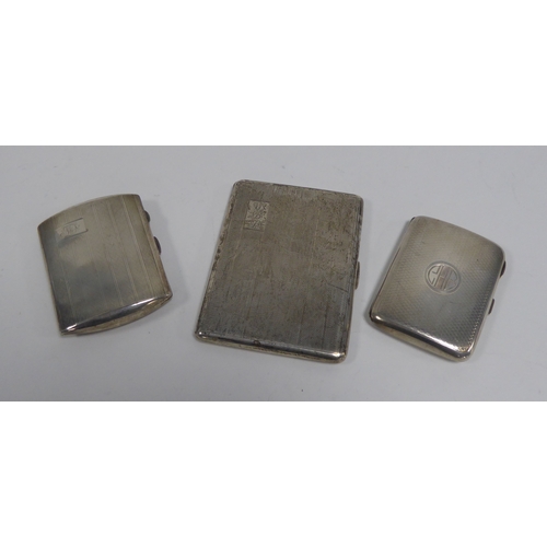 375 - THREE GEORGE V ENGINE TURNED SILVER POCKET CIGARETTE CASES, each initialled and with gilt interior, ... 