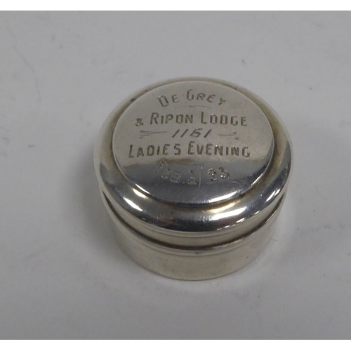 392 - SILVER SMALL CIRCULAR PILL BOX WITH MASONIC INSCRIPTION, the pull-off lid, engraved 'De-Grey & R... 