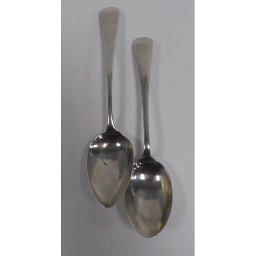 488 - TWO OLD ENGLISH PATTERN SILVER SERVING SPOONS, comprising: London 1806, crested, makers mark: HS, an... 