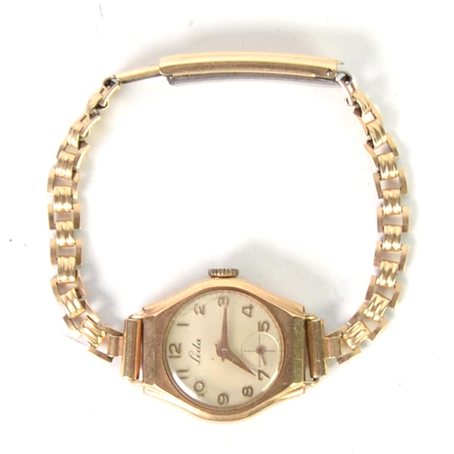 107A - LADY'S LEDA 9ct GOLD CASED WRISTWATCH with small circular arabic dial with subsidiary seconds dial, ... 