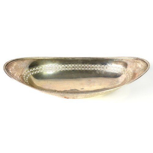 432 - GEORGE V PIERCED SILVER BREAD BASKET, of oval footed form with slender border and conforming base, 2... 