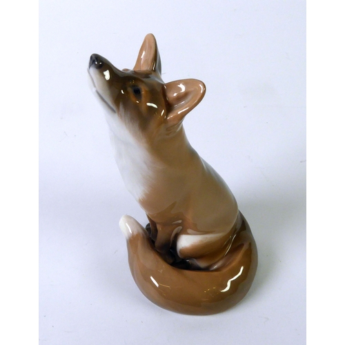 69 - ROYAL COPENHAGEN CHINA model of a seated fox smelling the air, 5 3/4