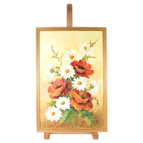 219 - LILIAN AIREY (TWENTIETH CENTURY)TWO SIGNED OIL PAINTINGS OF FLOWERSPoppies and Daisies, 1992 24” x 1... 