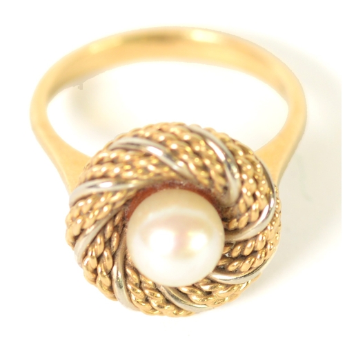 131 - 18ct GOLD RING with a single cultured pearl in a broad spiral wire pattern collar, ring size Q, 8.3g... 