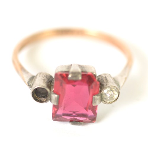 144 - 9ct GOLD AND SILVER RING, with a centre rectangular red stone and a tiny white stone (one tiny white... 