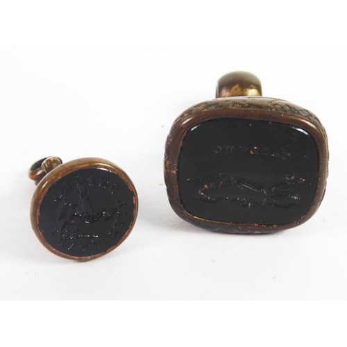 149 - 19th CENTURY GOLD PLATED FOB SEAL, the intaglio cut black onyx base showing a running fox and the wo... 