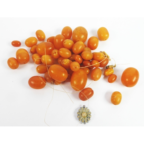 150 - FIFTY FOUR GRADUATED OVAL BUTTERSCOTCH AMBER BEADS, approximately 90gms, (c/r need stringing and req... 