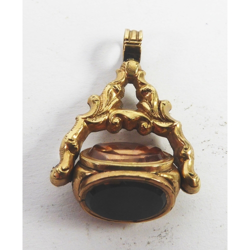 60 - 19th CENTURY SMALL GOLD THREE-SIDED REVOLVING FOB SEAL set with oval blood stone, white onyx and cit... 