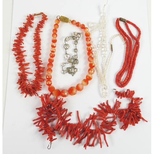 77 - TWO RED BRANCH CORAL NECKLACES; a red coral two strand BEAD NECKLACE; two crystal BEAD NECKLACES and... 