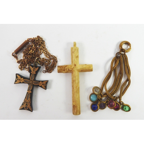 79 - PIQUE WORK CROSS PENDANT, on a gold plated fine chain necklace; a carved bone CROSS PENDANT; a gold ... 