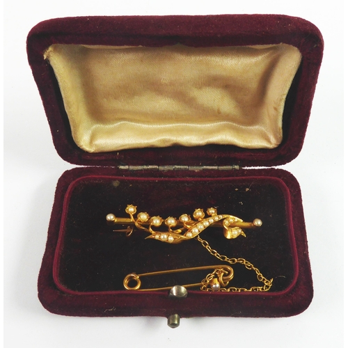 95 - VICTORIAN GOLD COLOURED METAL (UNMARKED) BAR BROOCH with seed pearl to each end and overlaid with a ... 