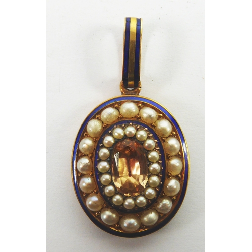 102 - VICTORIAN GOLD AND DARK BLUE GUILLOCHE ENAMELLED OVAL PENDANT, the three tier front set with a centr... 