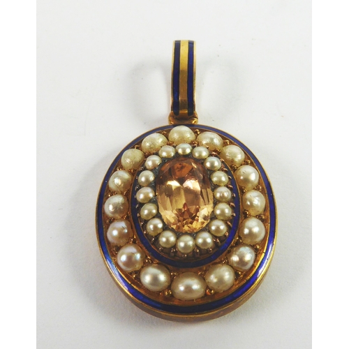 102 - VICTORIAN GOLD AND DARK BLUE GUILLOCHE ENAMELLED OVAL PENDANT, the three tier front set with a centr... 