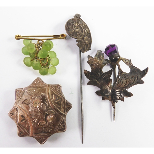 112 - VICTORIAN SILVER STAR SHAPED BROOCH engraved with flowers and foliage, some with gold overlay (pin m... 