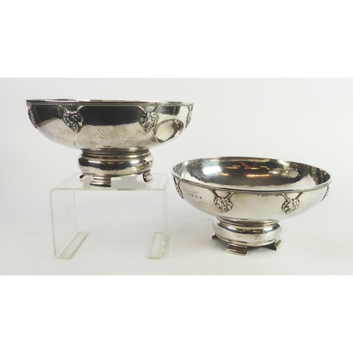 212 - GEORGE V SLIGHTLY GRADUATED PAIR OF PLANISHED SILVER FRUIT BOWL BY A E JONES, of shallow form with e... 