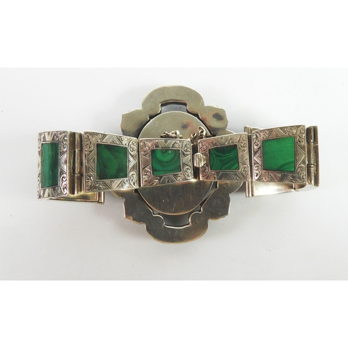 86 - VICTORIAN ENGRAVED SILVER COLOURED METAL (UNMARKED) AND MALACHITE BRACELET, the large oval top flank... 