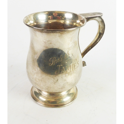 234 - GEORGIAN STYLE PRESENTATION SILVER PINT TANKARD, of bellied, footed form with scroll handle and moul... 