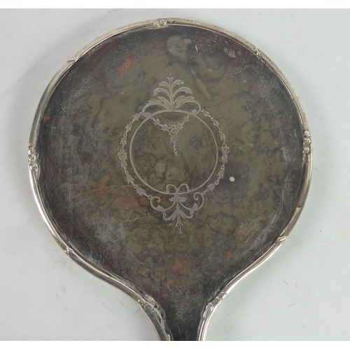 242 - GEORGE V SILVER AND PIQUE WORK CLAD LADYS HAND MIRROR, with circular bevelled plate, Birmingham 1919... 