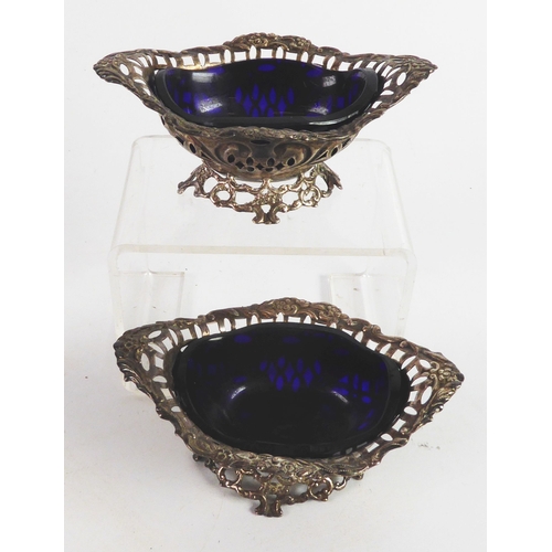 245 - PAIR OF VICTORIAN PIERCED SILVER OPEN SALTS BY JAMES DEAKIN & SONS, each of lozenge form with fl... 