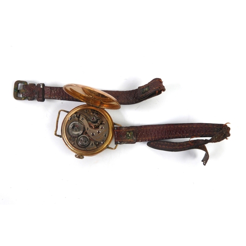 8 - ROLEX: An early 20th century 9ct gold Rolex trench watch with Roman dial, the works fully marked, ha... 