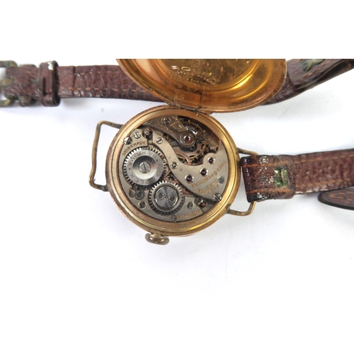 8 - ROLEX: An early 20th century 9ct gold Rolex trench watch with Roman dial, the works fully marked, ha... 