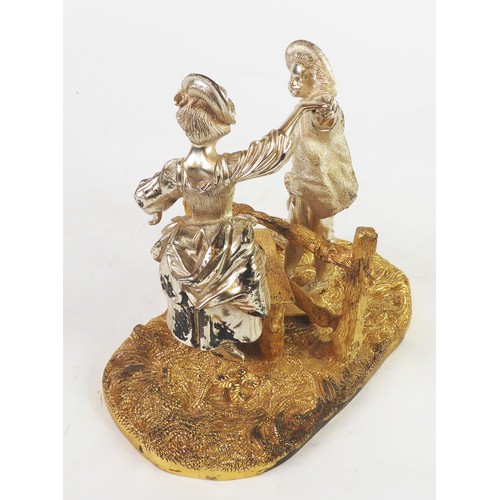 218 - MAPPIN & WEBB PARCEL GILT SILVER FIGURAL GROUP depicting a gallant helping a crinolined lady cli... 