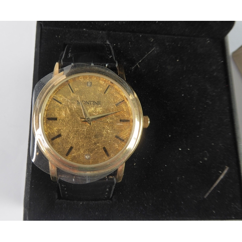 23 - GENT'S MONTINE QUARTZ WRISTWATCH, with gold plated case, the circular dial with batons, two set with... 