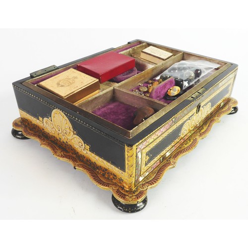 55 - VICTORIAN BLACK LACQUERED AND ELABORATELY GILT DECORATED JEWELLERY CASKET with engraved mother of pe... 